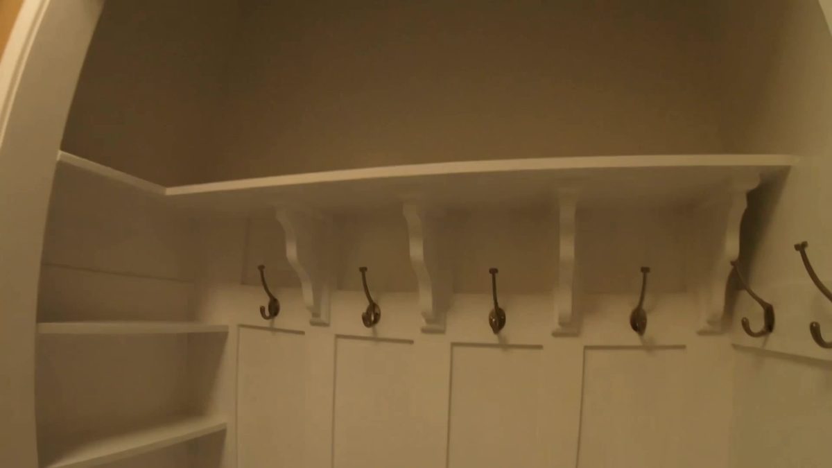 Custom painted millwork and coat hooks